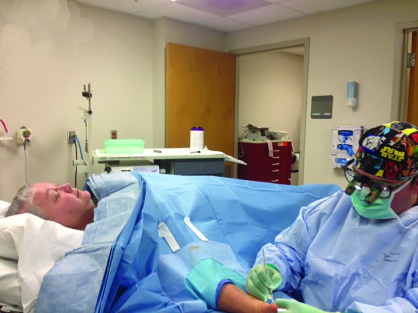 Dr. Dolan performs surgery.